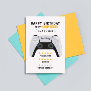 Funny gamer birthday card which reads 'happy birthday to my brilliant Grandson'. 5 stars for personality, 5 stars for gaming and 1 star for tidying bedroom. The card features an illustration of a PS5 controller and can be personalised with a name.