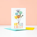 Load image into Gallery viewer, Bright and happy new baby card featuring a variety of balloon animals. Includes any personalised name in peach
