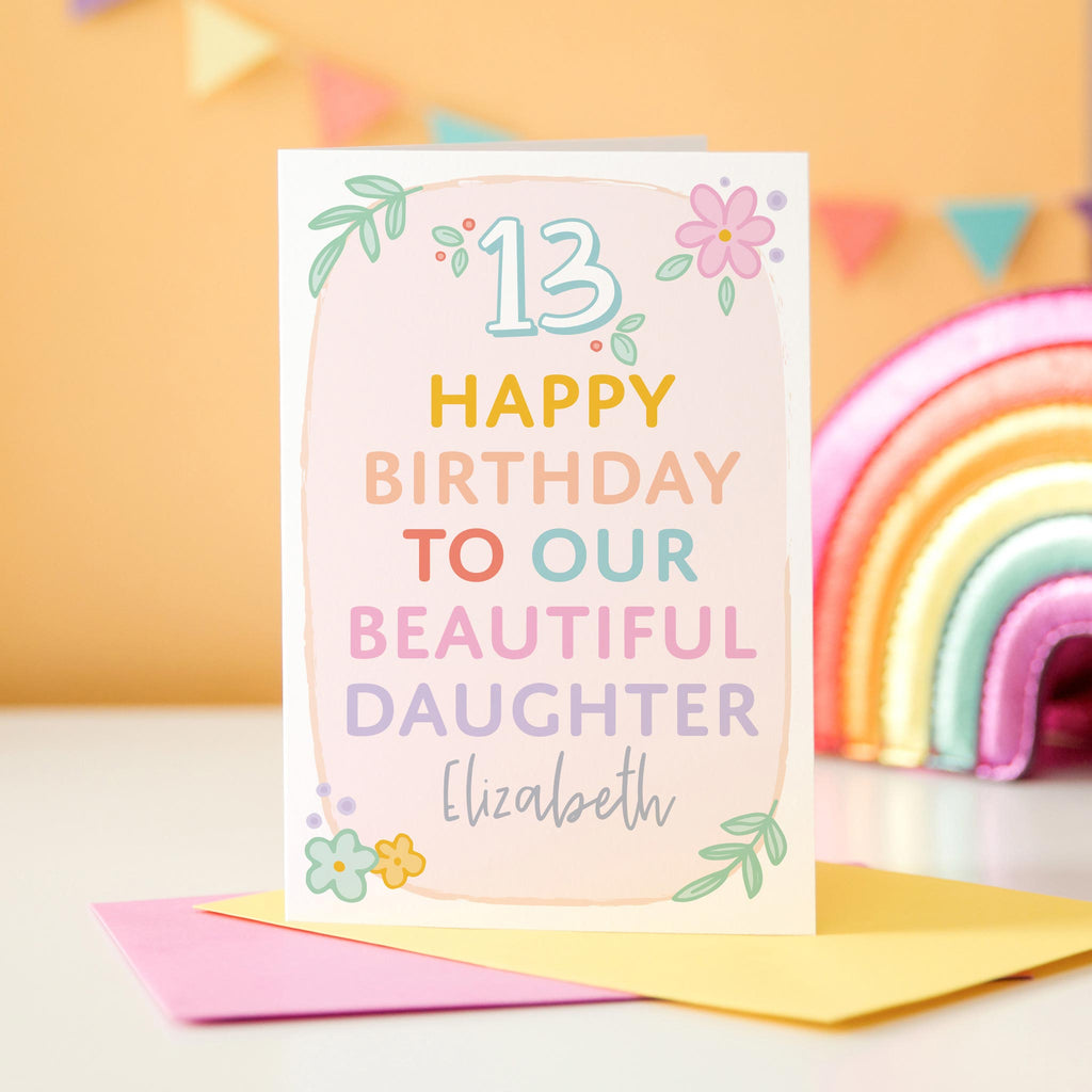 Colourful happy birthday card to a beautiful daughter. Personalised for any name and age in pastel colours with flowers. Shown with age 13