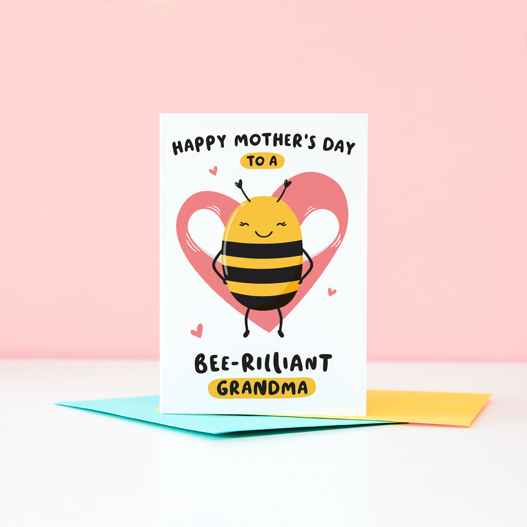 Happy mother’s day  to a bee-rilliant Grandma. A cute and punny card featuring a happy bee to represent Grandma, with a pink heart in the background and a collection of small hearts.