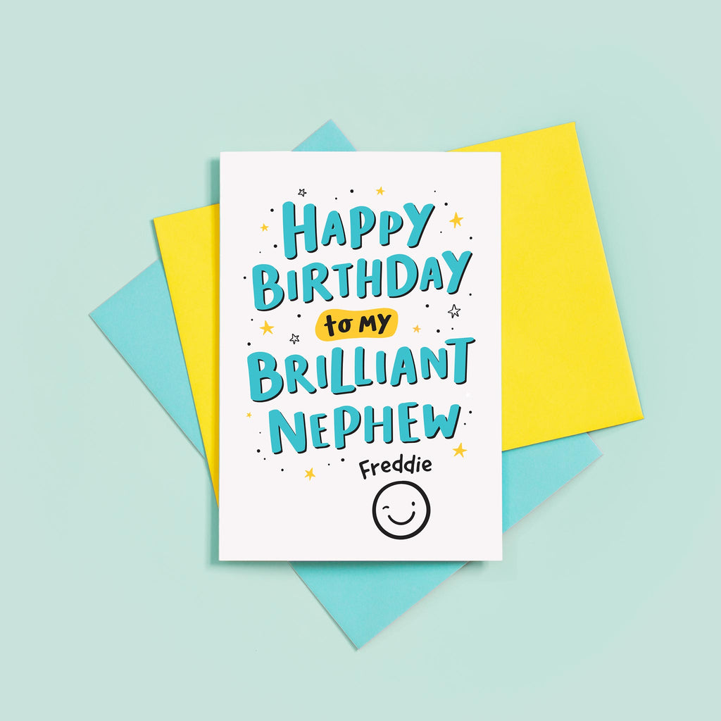 A hand lettered typographic card for a brilliant Nephew. The card features a collection of stars around the text and can be personalised with a name above a winking smiley face.