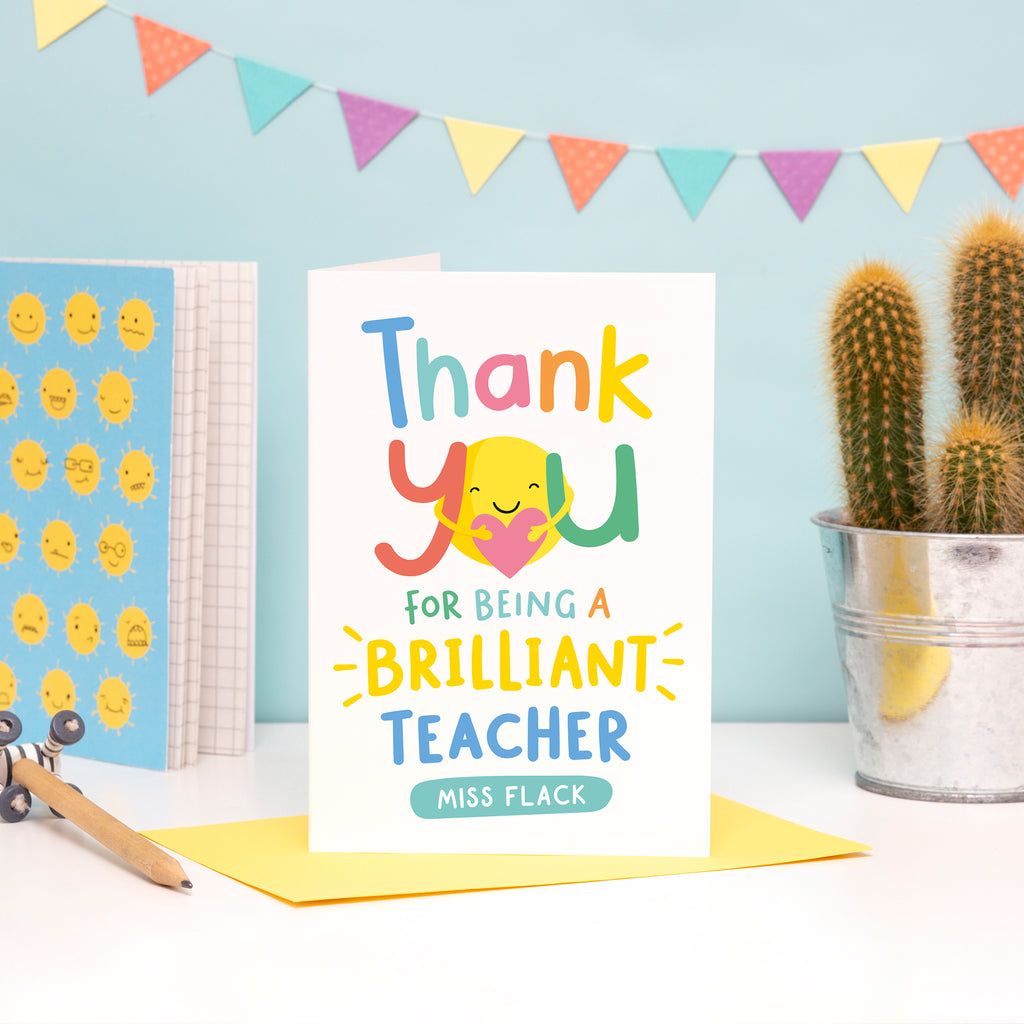 A bright and colourful card featuring hand lettering with the words, thank you for being a brilliant teacher. There is space for personalising with the teachers name.