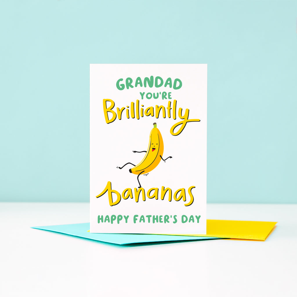 A bright and happy Father’s Day card featuring a dancing banana with a silly face and the words Grandad, you're brilliantly bananas.