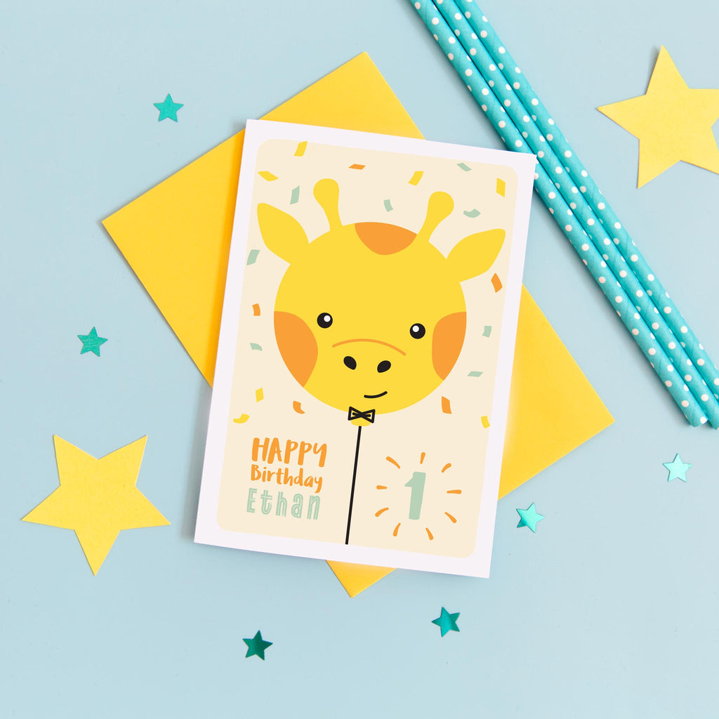 Happy birthday card with cute baby giraffe face on a balloon and any personalised name and age.