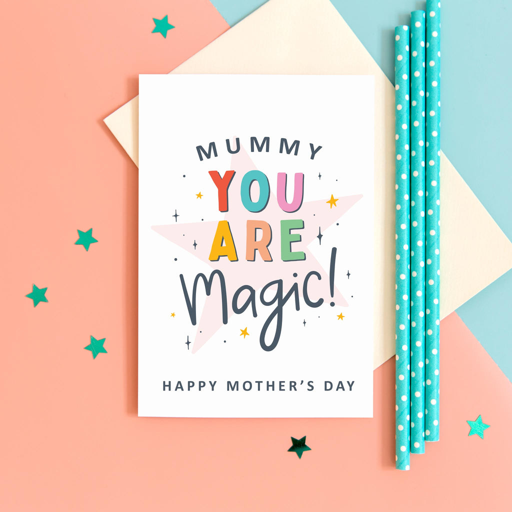 Mummy you are magic. Happy Mother's day. This bright a colourful typographic card features stars and bold text.