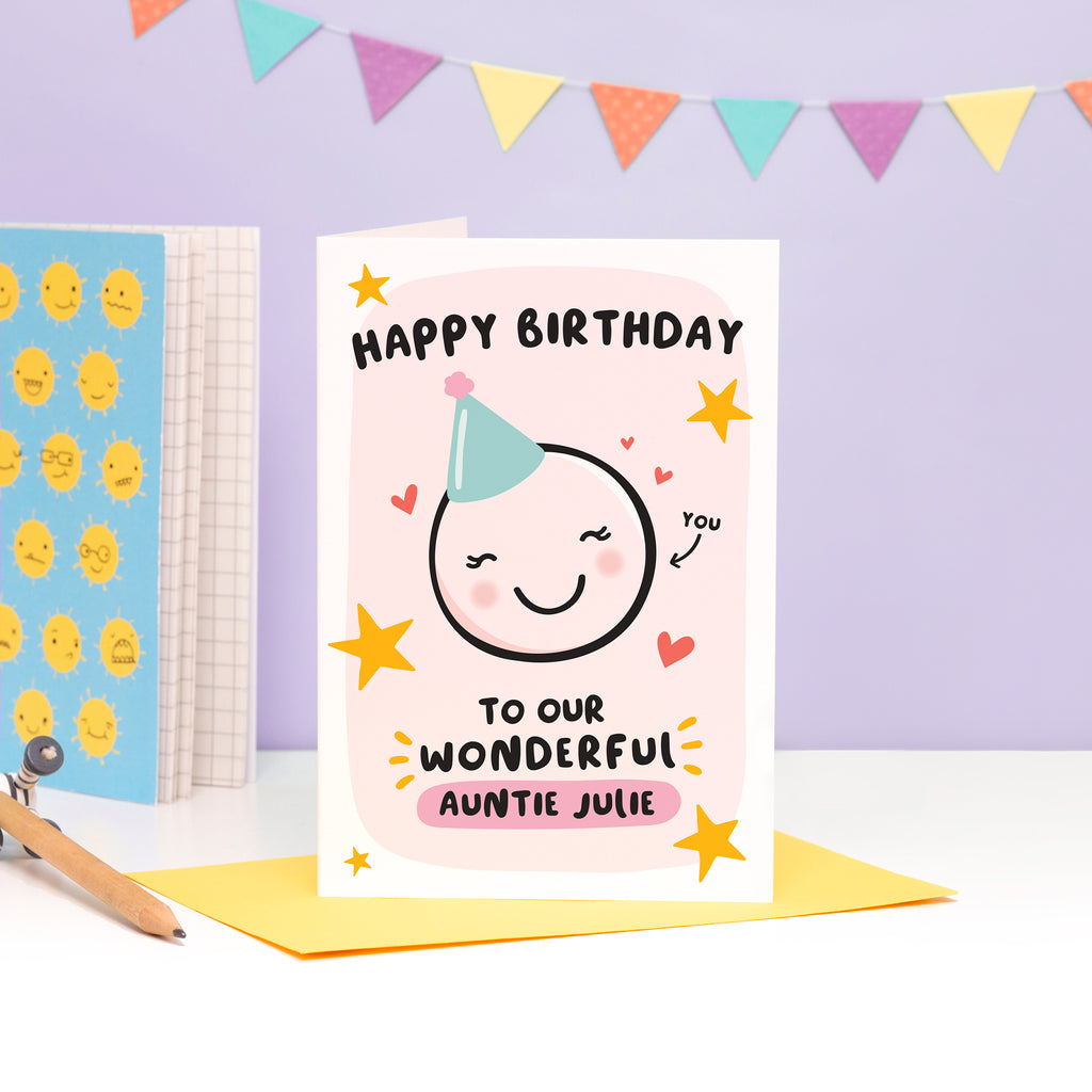 Happy birthday to our wonderful Auntie. A super cute card featuring a happy face wearing a party hat to represent Auntie, with a collection of stars and hearts. The card can be personalised with Aunties name.