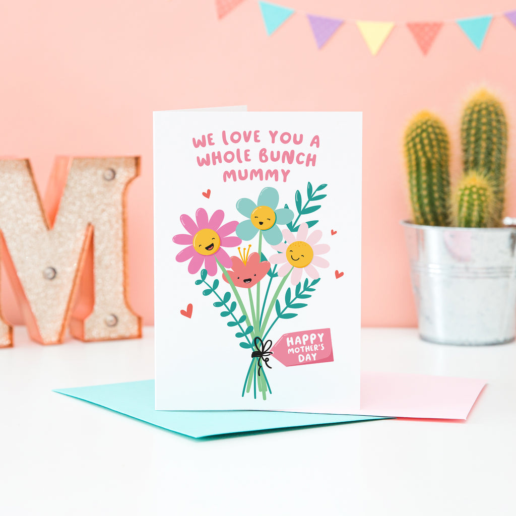 We love you a whole bunch mummy, happy mother's day. A super cute card featuring a bunch of happy smiling flowers and a collection of small hearts. This card can be personalised with Mummy's preferred name.