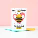 Load image into Gallery viewer, Happy mother’s day  to a bee-rilliant Nana. A cute and punny card featuring a happy bee to represent Nana, with a pink heart in the background and a collection of small hearts.
