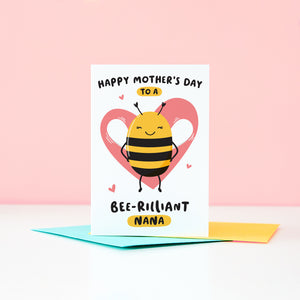 Happy mother’s day  to a bee-rilliant Nana. A cute and punny card featuring a happy bee to represent Nana, with a pink heart in the background and a collection of small hearts.