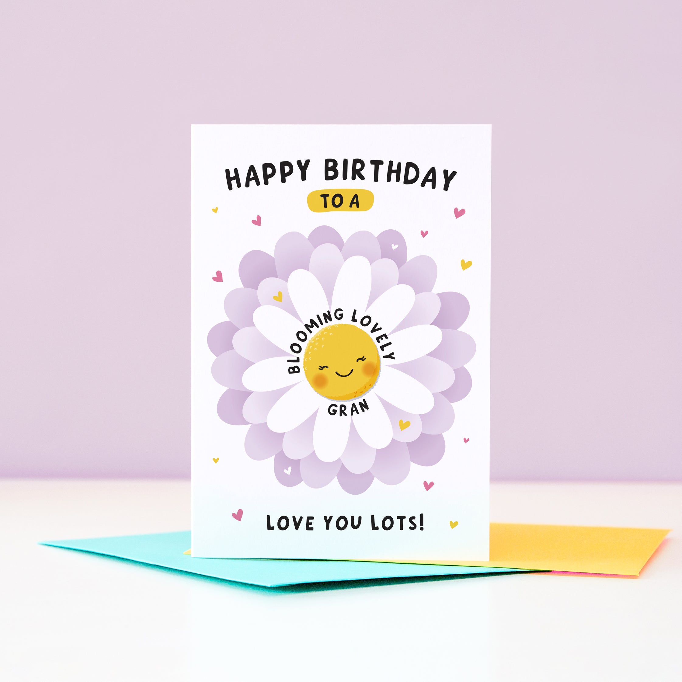 Text on this card reads ‘Happy birthday to a blooming lovely Gran, love you lots!’. A cute and punny card featuring a happy flower in full bloom to represent Grandma, with a collection of hearts. The card can be personalised with Grandma’s preferred name eg. Gran, Grannie, Nana etc.