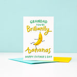 Load image into Gallery viewer, A bright and happy Father’s Day card featuring a dancing banana with a silly face and the words Grandad, you&#39;re brilliantly bananas.
