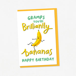 A bright and happy Birthday card featuring a dancing banana with a silly face and the words Gramps, you're brilliantly bananas.