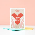 Load image into Gallery viewer, A cute Easter card featuring a fluffy bunny holding a red love heart. The card can be customised for any recipient and there is space on the love heart to include a name too.
