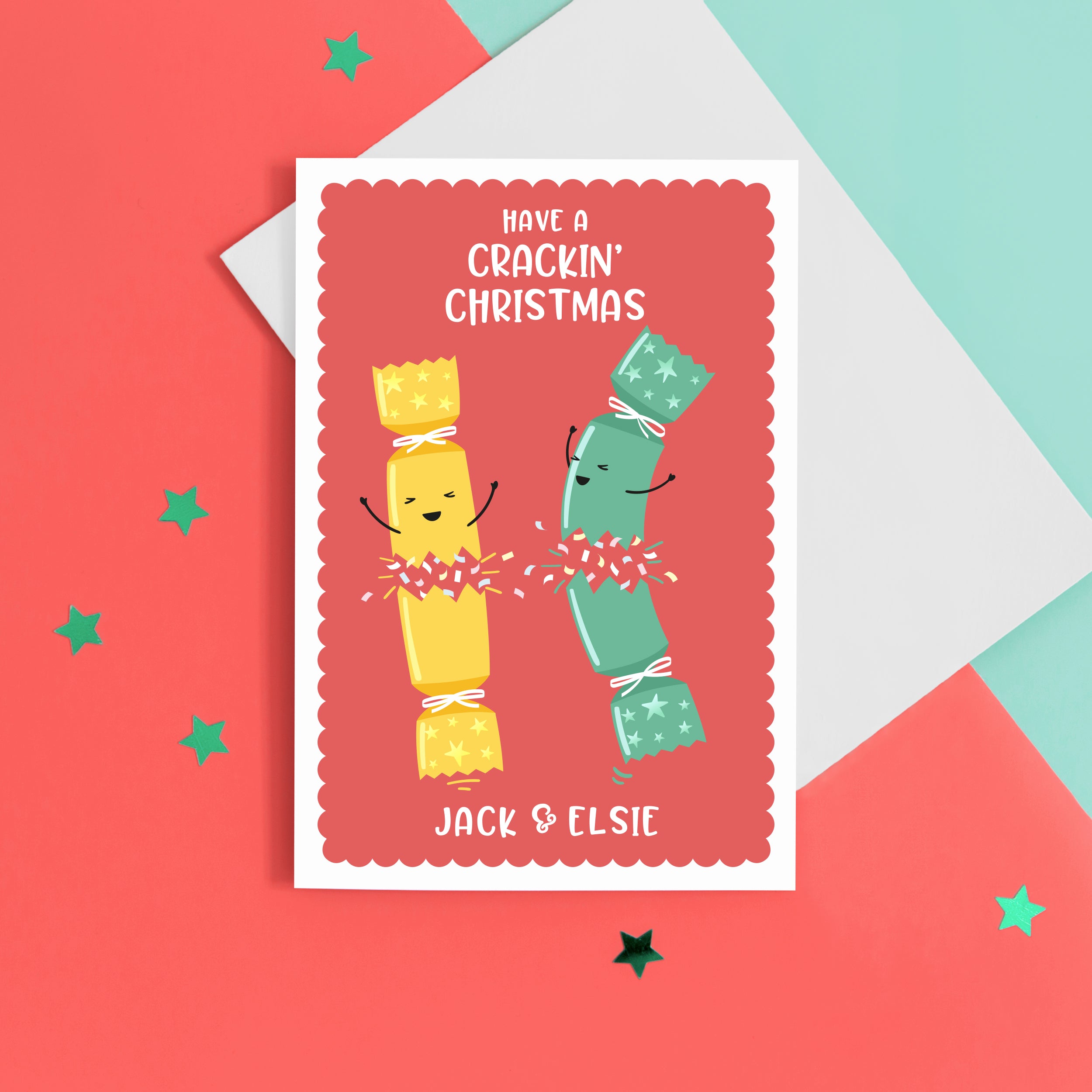 A funny Christmas card with a red background, featuring two happy Christmas crackers and the words 'have a crackin' Christmas', with space to personalise with a name at the bottom.