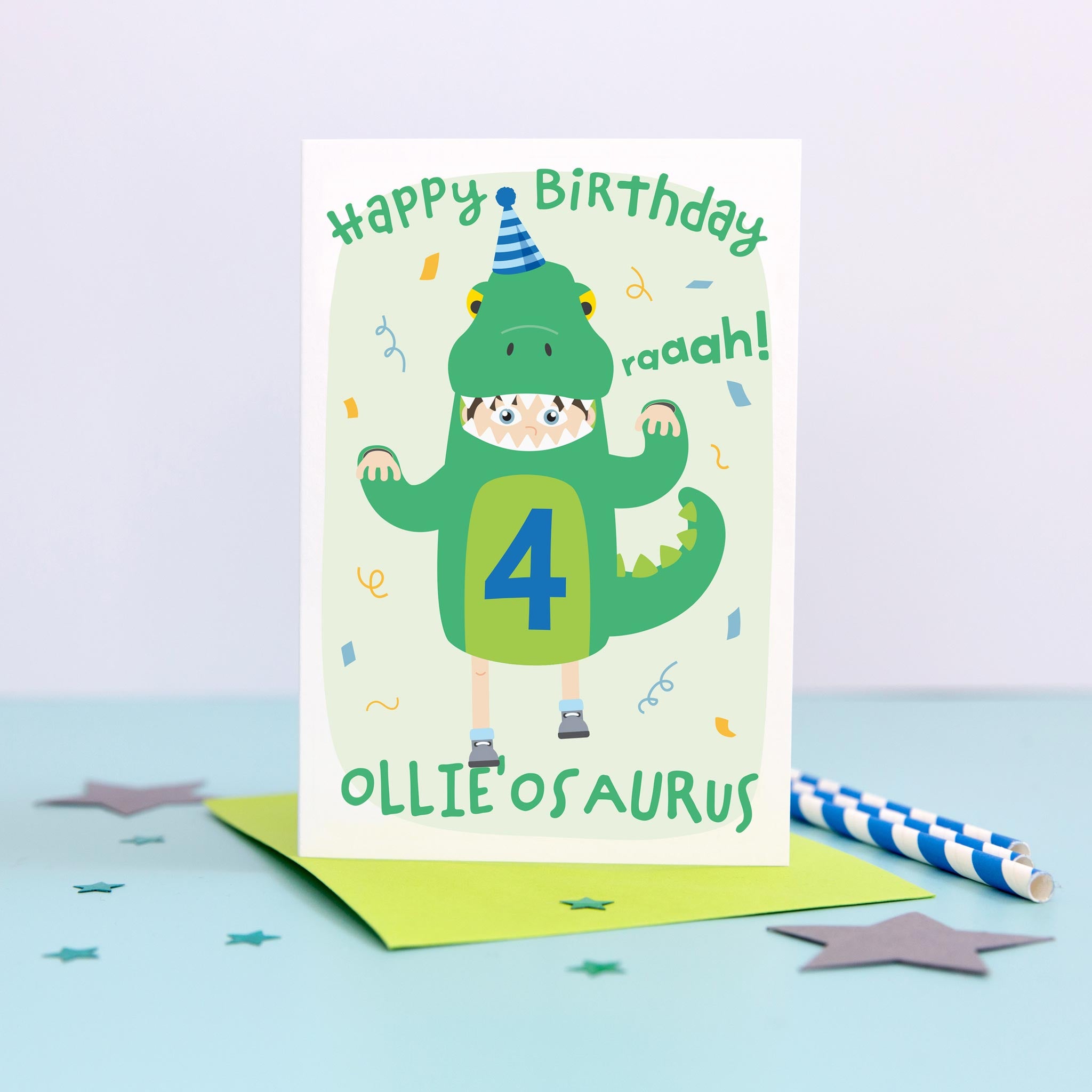 Birthday card with cute boy dressed in a dinosaur costume. Personalised for any name and age, as well age eye colour, skin colour and hair colour. Shown age four.