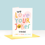 Load image into Gallery viewer, We love your jokes Grandad, and we love you too! A funa and colourful birthday or father&#39;s day card for grandad with colourful text and a laughing face. Personalise this card with whatever your pet name for grandad is.
