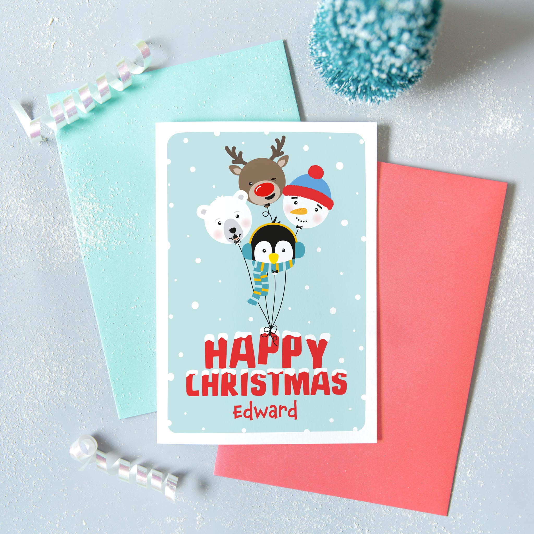 Happy Christmas. A cute personalised Christmas card featuring a collection of balloon characters - polar bear, penguin, snowman and red nosed reindeer. Set against a turquoise background and red text. Add any name to this card.