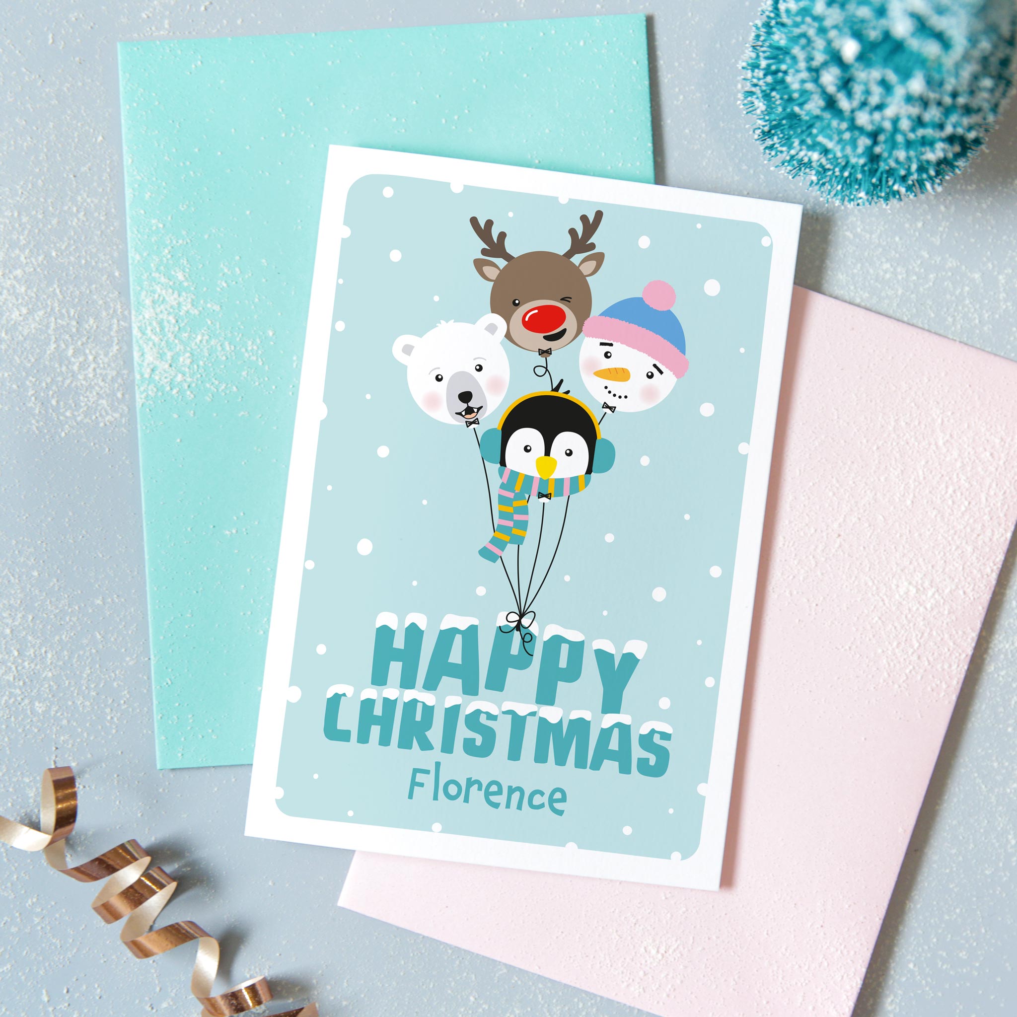 Happy Christmas. A cute personalised Christmas card featuring a collection of balloon characters - polar bear, penguin, snowman and red nosed reindeer. Set against a turquoise background and text. Add any name to this card.