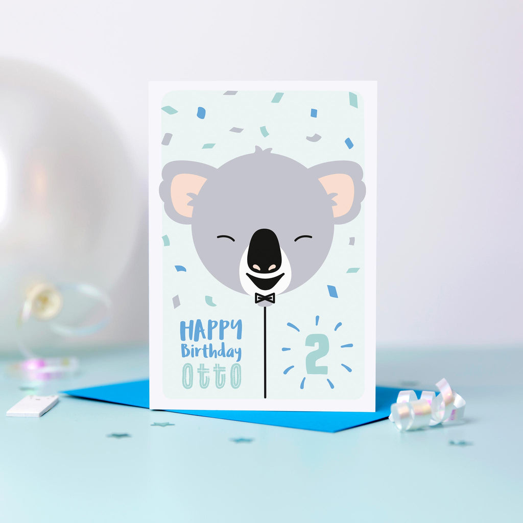 Koala balloon birthday card. A cute card featuring a baby Koala face on a balloon and personalised with any name and age