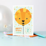 Load image into Gallery viewer, Happy birthday card with cute baby lion face on a balloon and any personalised name and age.
