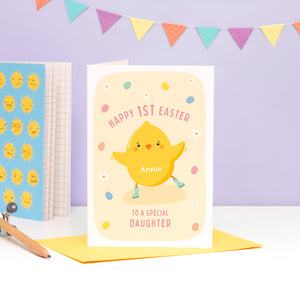 A super cute 1st Easter card featuring a little Easter Chick, mini eggs and spring daisies. The card can be personalised for any recipient and can include baby's name.