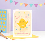 Load image into Gallery viewer, A super cute 1st Easter card featuring a little Easter Chick, mini eggs and spring daisies. The card can be personalised for any recipient and can include baby&#39;s name.
