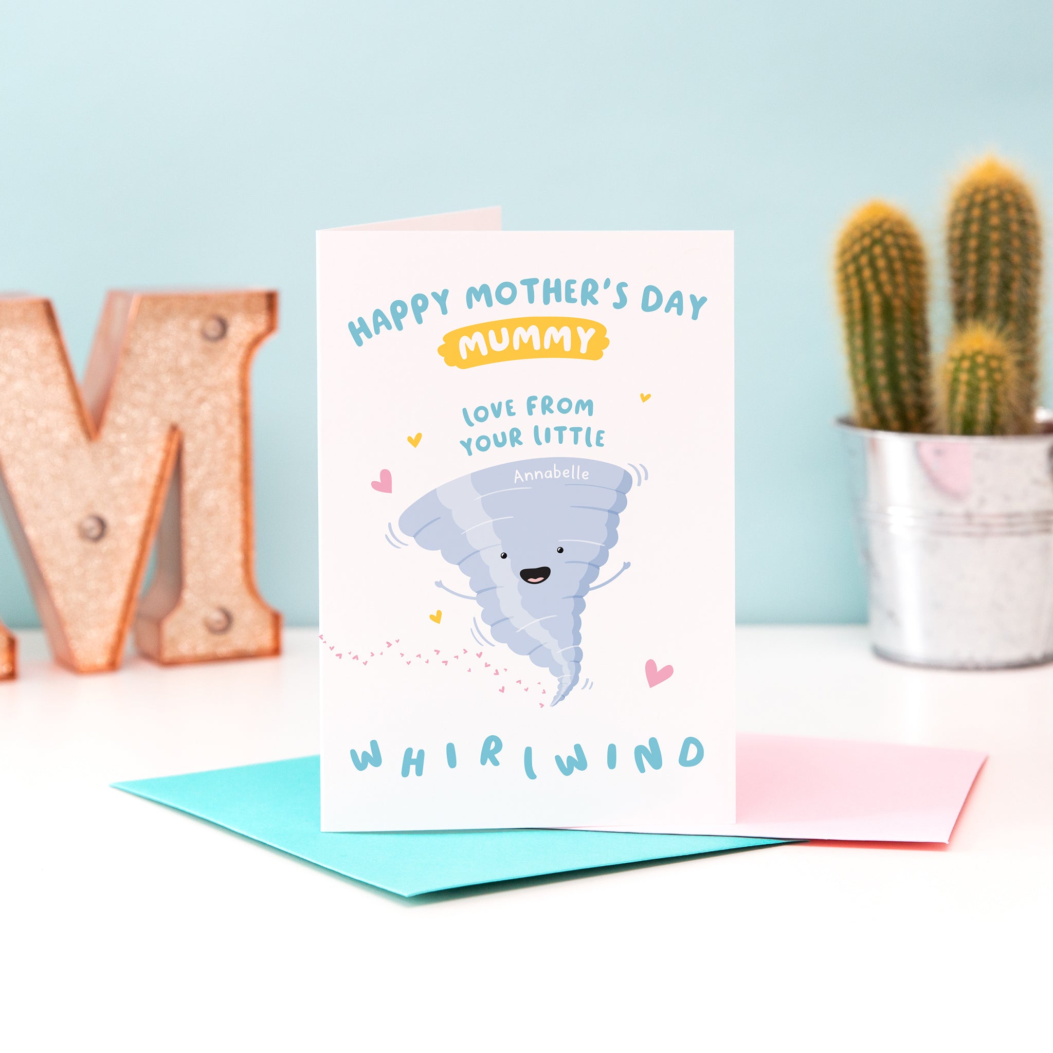 A cute Mother's day card from her little whirlwind. The card reads ‘happy mother’s day mummy love from your little whirlwind and features a happy whirlwind illustration with a collection of hearts. The whirlwind represents the child and can be personalised with a name.