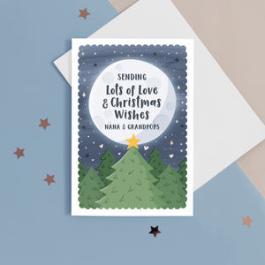 Sending lots of love and Christmas wishes – Nana and Grandpops. This beautiful Christmas card features festive trees with a star in front of a glowing distant moon which has the personalised message on. This card reads ‘sending lots of love and Christmas wishes Nana and Grandpops’, the names for grandparents can be personalised.