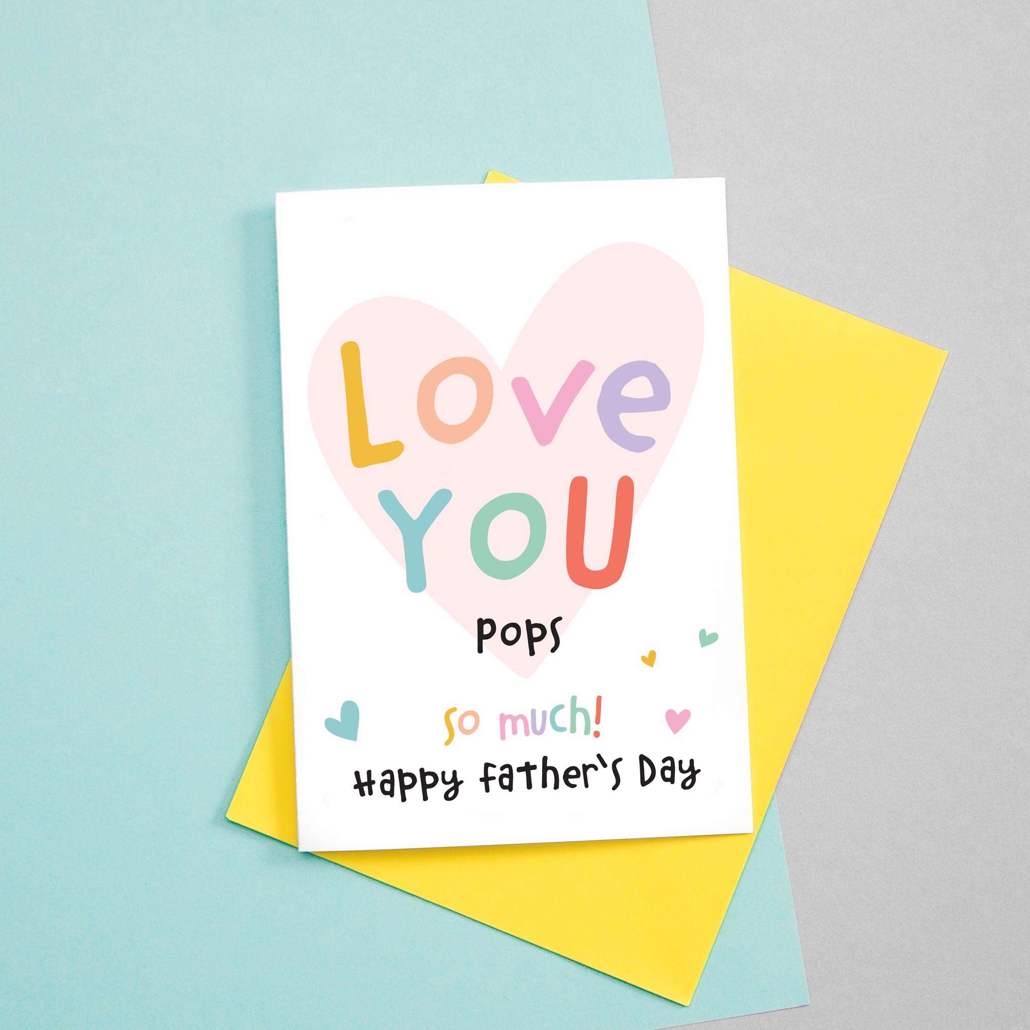 Love you Pops, so much! Happy Father's day. Cute and colourful greetings card for Dad. Includes a heart on white background and multi coloured text. Daddy can be changed to Dad, Daddy, Dada etc..