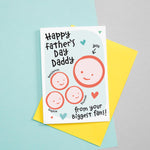 Load image into Gallery viewer, Happy first Father&#39;s day - from your biggest fans. This sweet Father&#39;s day card features smiling father and three childrens faces with hearts against a turquoise background. Each child&#39;s name can be added.
