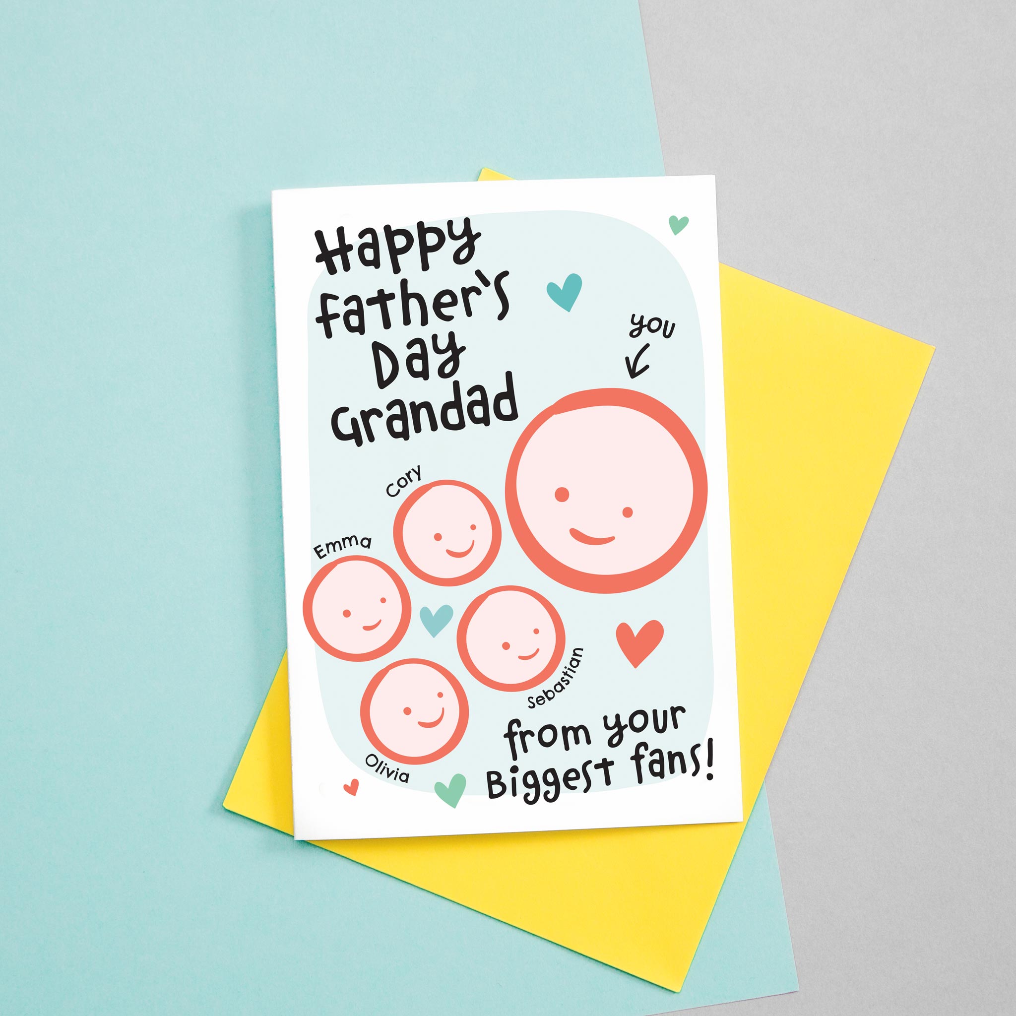 Happy Father's day Grandad - from your biggest fans! A cute greetings card for Grandad featuring the smiling faces of four children which can be customised to include their names. The card colours are Turquoise and red.