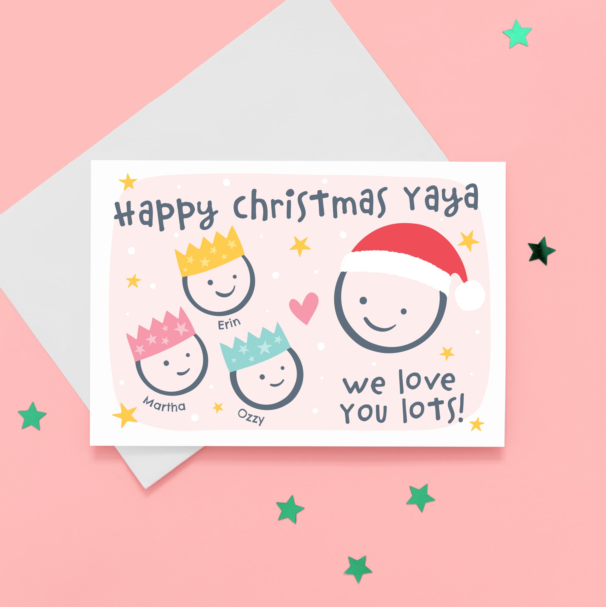 Happy Christmas Yaya, we love you lots. Cute Christmas card featuring 4 faces representing Grandmother and 3 grandchildren. The smaller faces wear Christmas party hats and the larger face a santa hat. The card is personalised with the children's names and has a soft pink background.