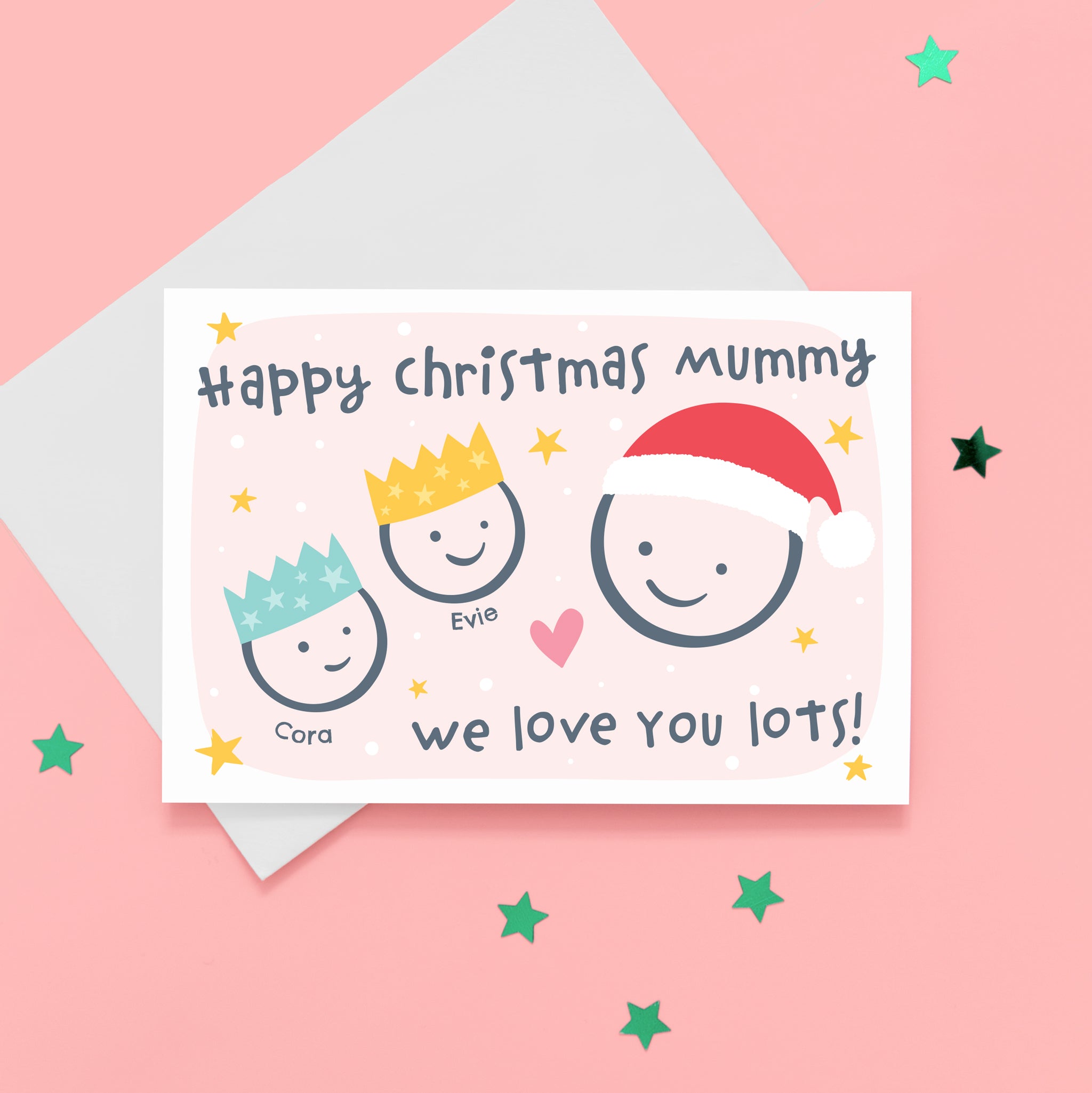 Happy Christmas Mummy, we love you lots. Cute Christmas card featuring 3 faces representing Mummy and 2 children. The smaller faces wear Christmas party hats and the larger face a santa hat. The card is personalised with the children's names and has a soft pink background.