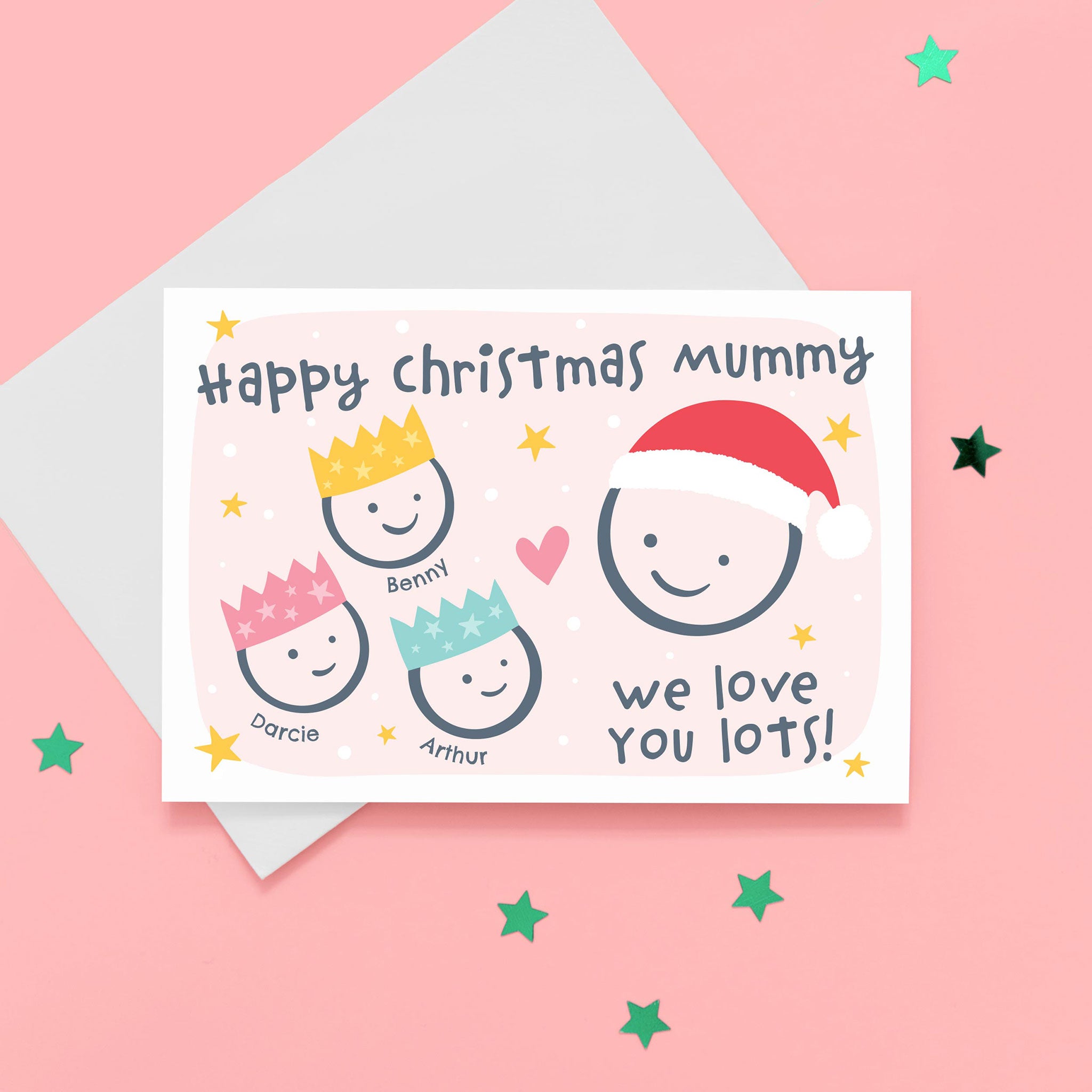 Happy Christmas Mummy, we love you lots. Cute Christmas card featuring 4 faces representing Mummy and 3 children. The smaller faces wear Christmas party hats and the larger face a santa hat. The card is personalised with the children's names and has a soft pink background.