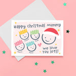 Load image into Gallery viewer, Happy Christmas Mummy, we love you lots. Cute Christmas card featuring 5 faces representing Mummy and 4 children. The smaller faces wear Christmas party hats and the larger face a santa hat. The card is personalised with the children&#39;s names and has a soft pink background.
