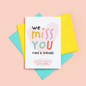 We miss you card. Cute and colourful text over a love heart. This card is personalised with the recipients name and includes the message, 'We can't wait to see you soon'