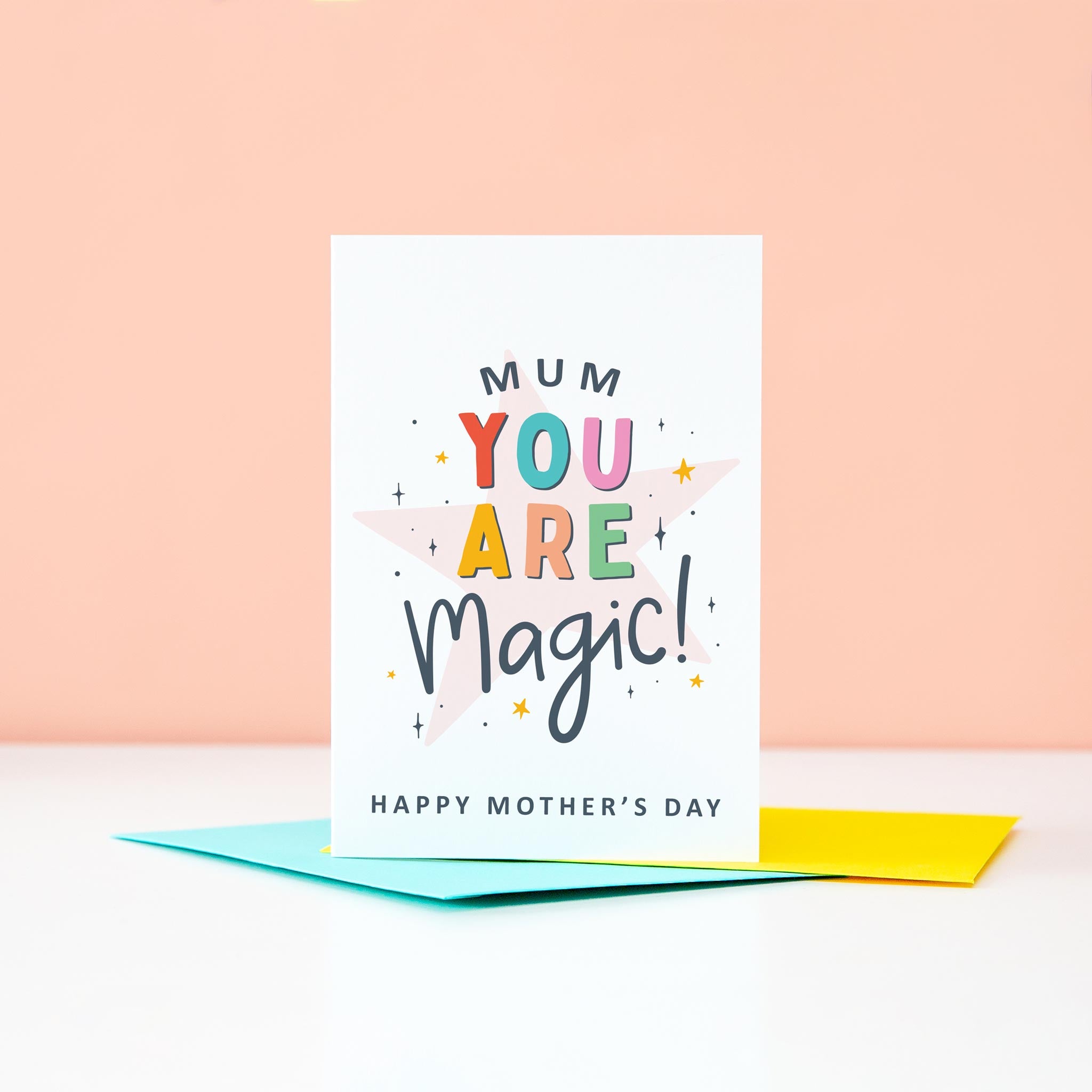 Mum you are magic. Happy Mother's day. This bright a colourful typographic card features stars and bold text.