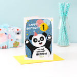 Load image into Gallery viewer, A fun and colourful card featuring a happy panda wearing a party hat, a collection of smiling balloons and a pop of confetti. The card reads happy birthday to our brilliant nephew with space to personalise with a name. There is also space on a balloon to add the childs age.
