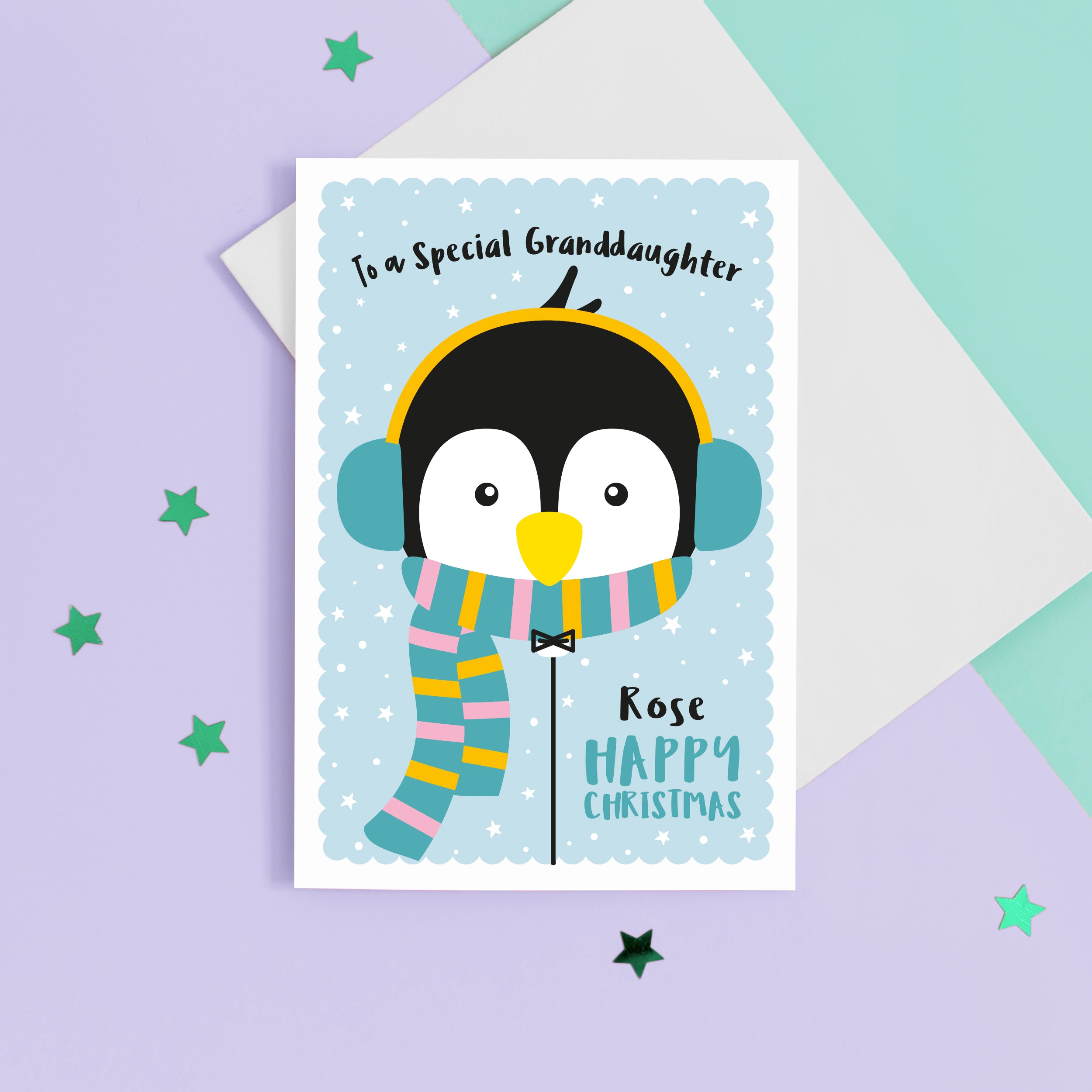 Happy christmas to a special Granddaughter. A cute personalised Christmas card featuring a penguin in snow wrapped up with earmuffs and scarf. Add any name and personal greeting to this card.