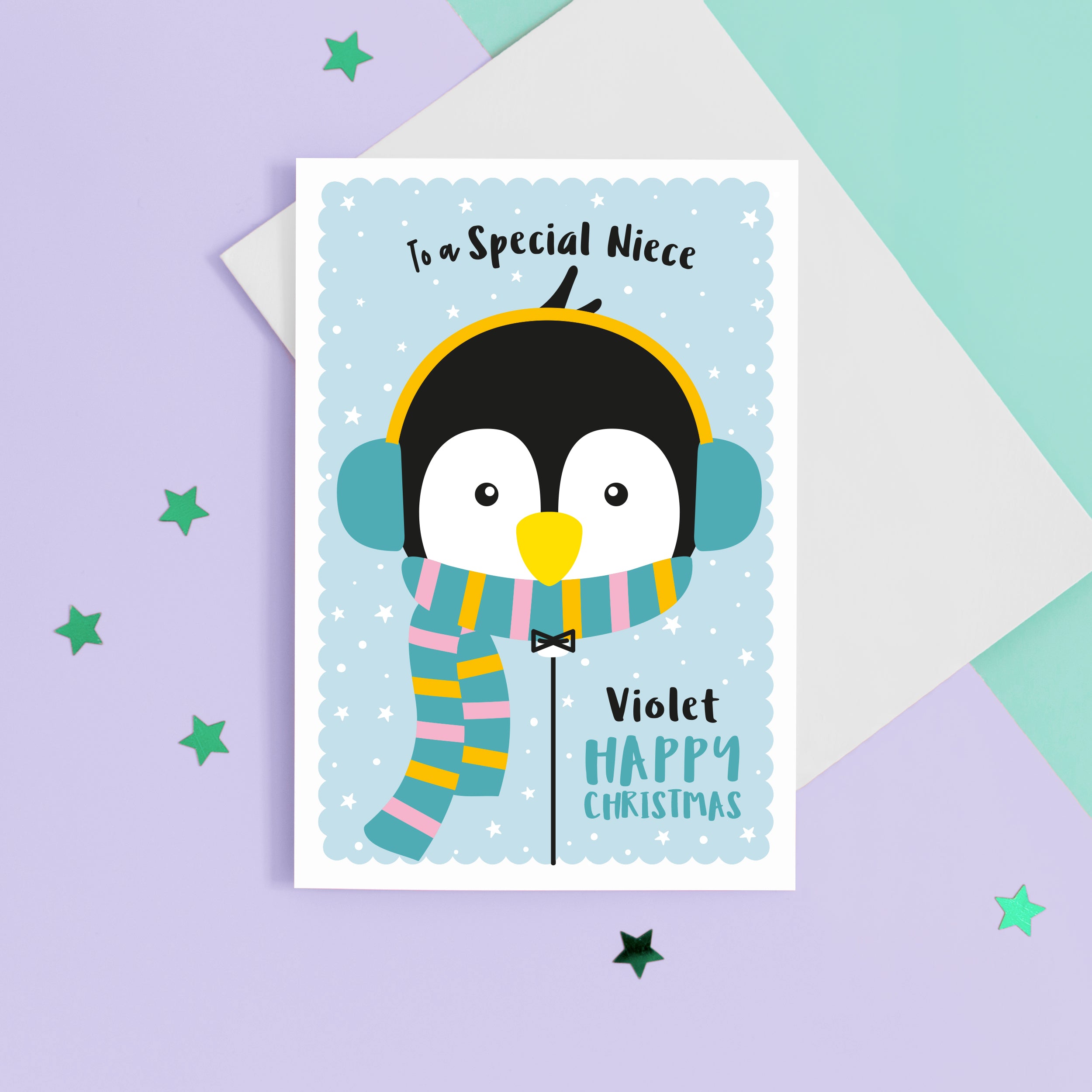 Happy christmas to a special Niece. A cute personalised Christmas card featuring a penguin in snow wrapped up with earmuffs and scarf. Add any name and personal greeting to this card.