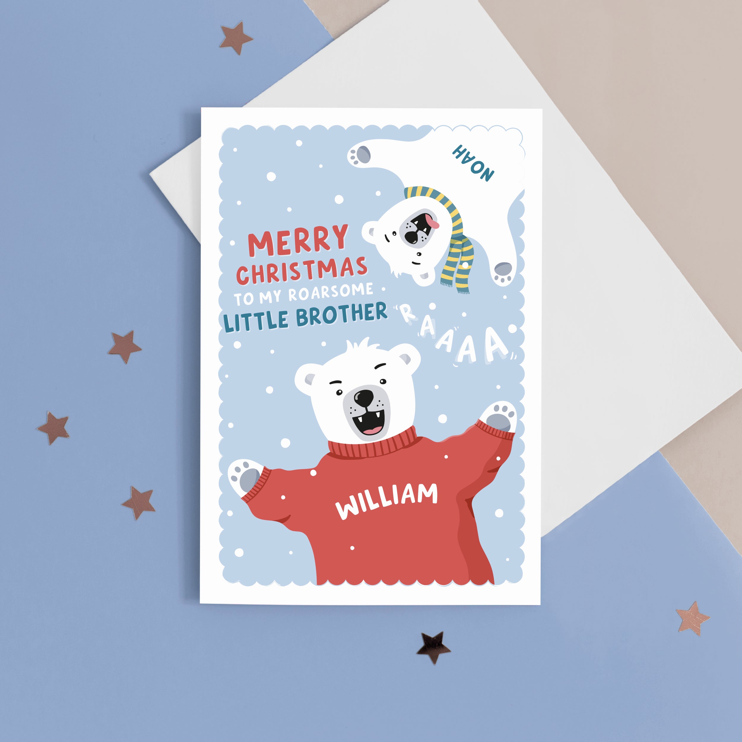 A fun Christmas card featuring two polar bears on a blue snowy background. The card reads ‘Merry Christmas to my roarsome little Brother’. The polar bears can be personalised with names to represent siblings. 