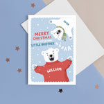 Load image into Gallery viewer, A fun Christmas card featuring two polar bears on a blue snowy background. The card reads ‘Merry Christmas to my roarsome little Brother’. The polar bears can be personalised with names to represent siblings. 
