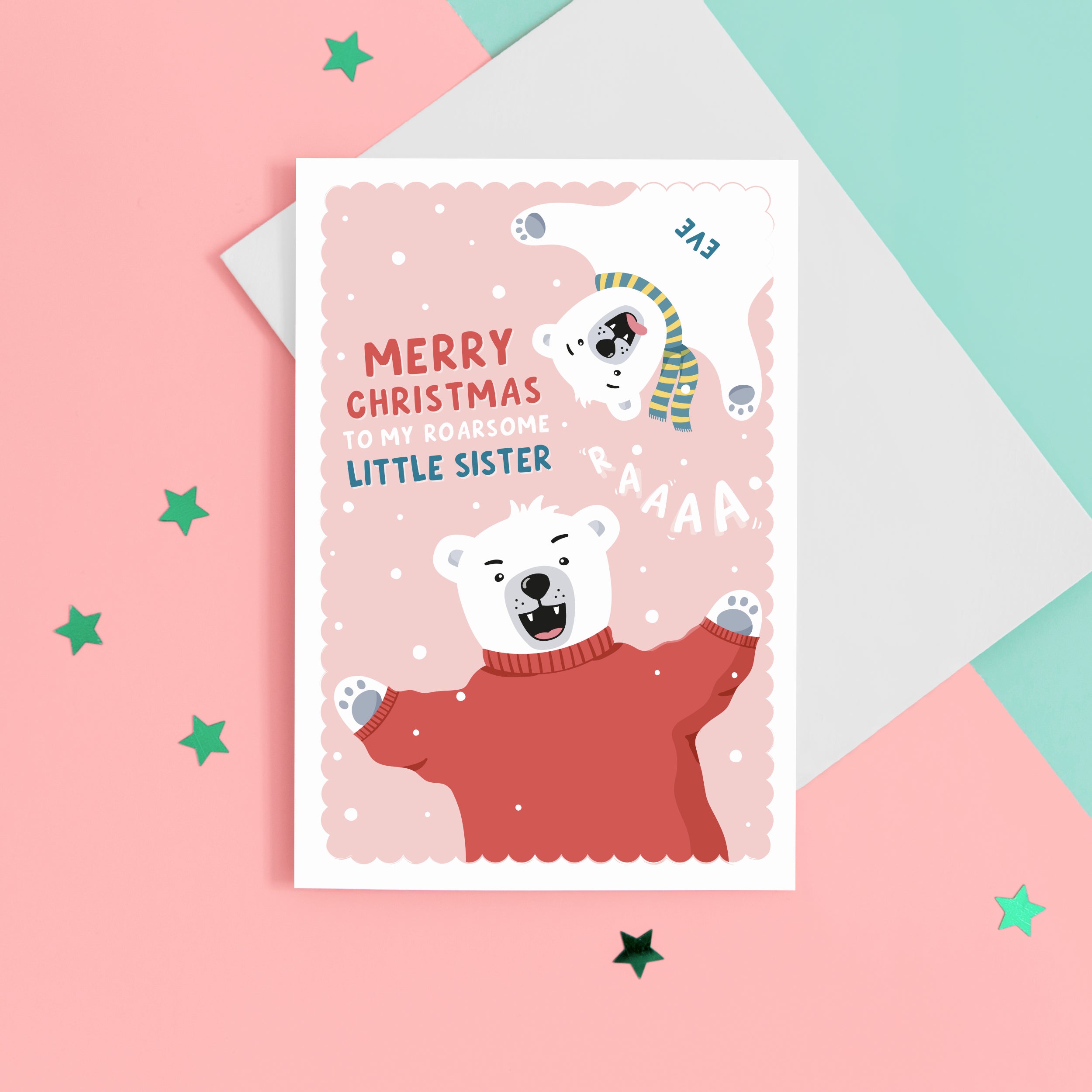 A fun Christmas card featuring two polar bears on a pink snowy background. The card reads ‘Merry Christmas to my roarsome little Sister’. The polar bears can be personalised with names to represent siblings. 