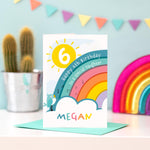 Load image into Gallery viewer, Happy 6th birthday to a special Daughter. This bright and colourful birthday card features a shining sun with age, a rainbow with personalised message, happy singing bird, clouds and any personalised name.
