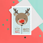 Load image into Gallery viewer, To a special Cousin, Happy Christmas. A cute personalised christmas card featuring a cheeky, winking reindeer balloon in snow and stars. Add any name and personal greeting to this card.
