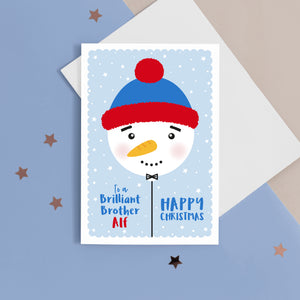 To a brilliant Brother, Happy Christmas. A cute personalised christmas card featuring a cute snowman balloon on blue background with snow and stars. Add any name and personal greeting to this card.