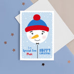 Load image into Gallery viewer, To a special Son, Happy Christmas. A cute personalised christmas card featuring a cute snowman balloon on blue background with snow and stars. Add any name and personal greeting to this card.
