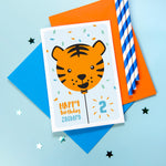 Load image into Gallery viewer, Happy birthday card with cute baby tiger face on a balloon and any personalised name and age.
