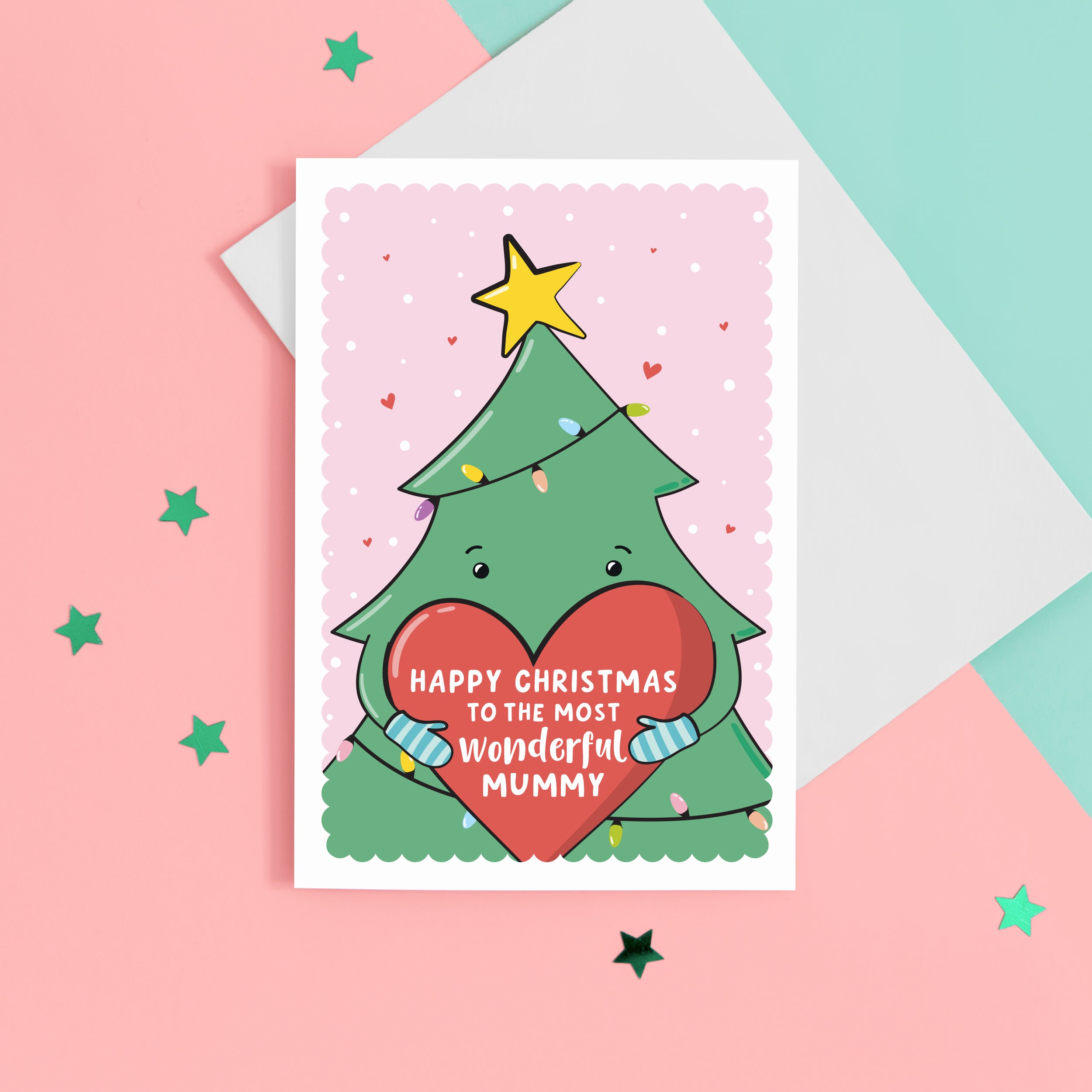 A cute Christmas card featuring a cartoon Christmas tree hugging a large love heart. The love heart reads, "Happy Christmas to the most wonderful Mummy". A yellow star is on the top of the tree set against a light pink snowy background with love hearts. The card can be personalised with the preferred name for Mummy eg. Mum, Mama etc.