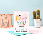 Load image into Gallery viewer, We love you mummy. Personalised happy birthday card for mum with colourful text and love heart. Personalise with the title of your choosing - Mum, mummy, mam, mom etc.
